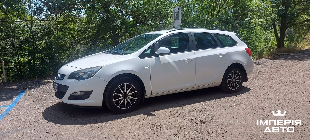 Opel Astra - фото 1