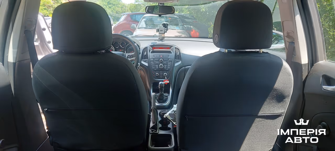 Opel Astra - фото 13