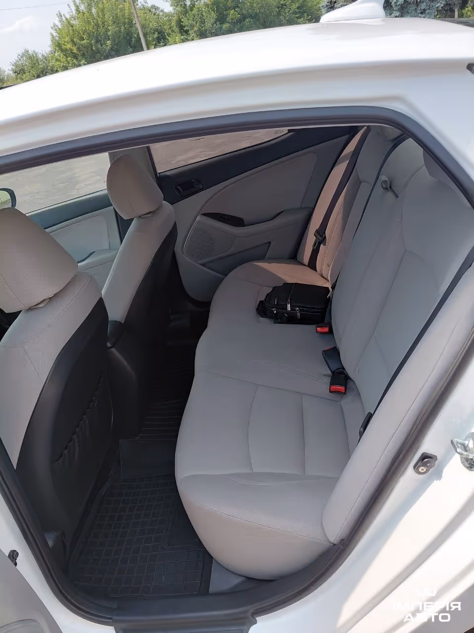 Kia Optima - фото 12