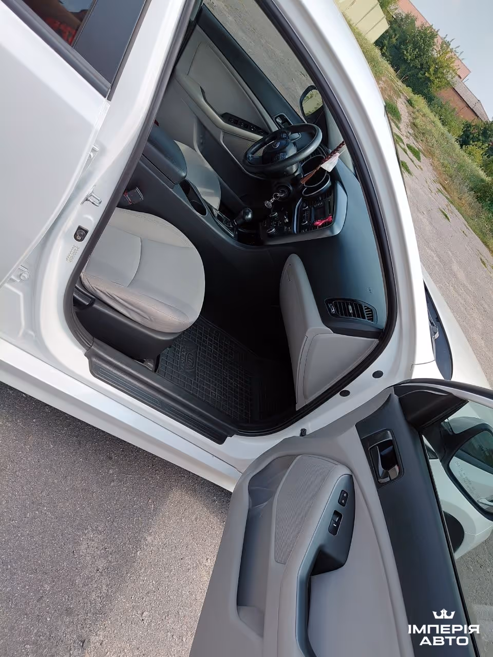 Kia Optima - фото 11
