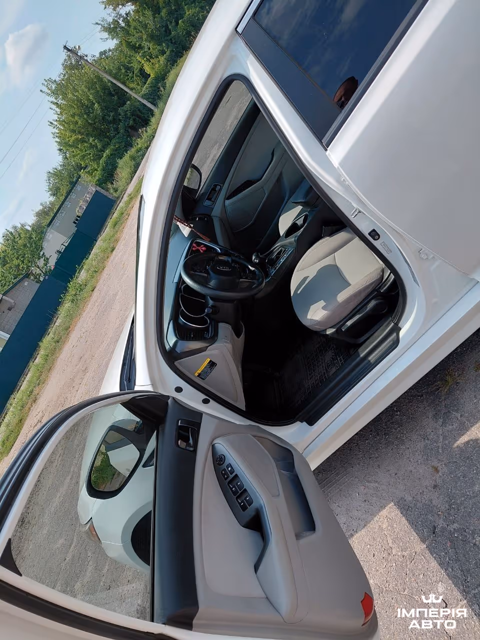 Kia Optima - фото 9