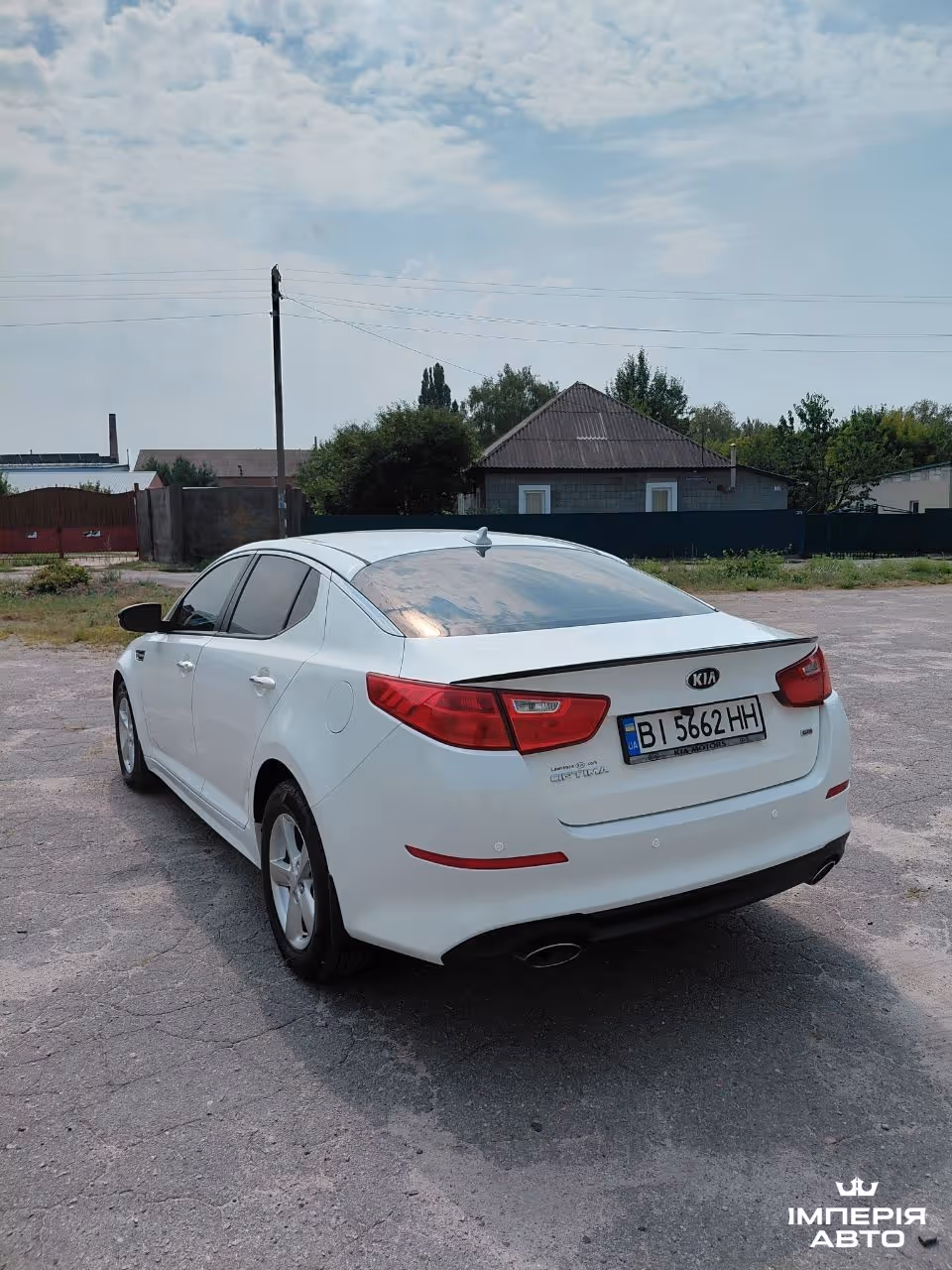 Kia Optima - фото 5