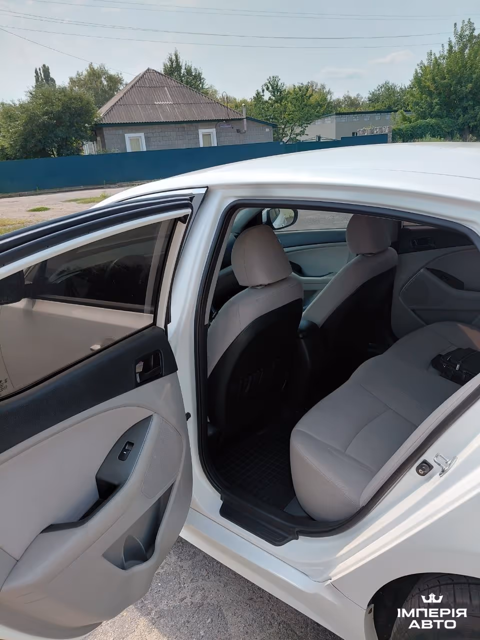 Kia Optima - фото 13