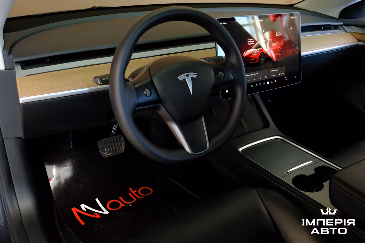 Tesla Model 3 - фото 7