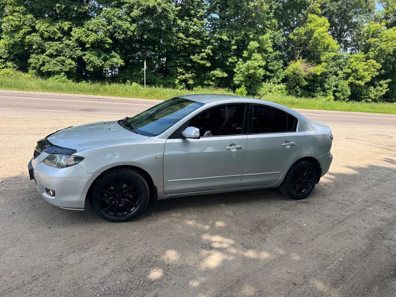 Mazda 3 - фото 7