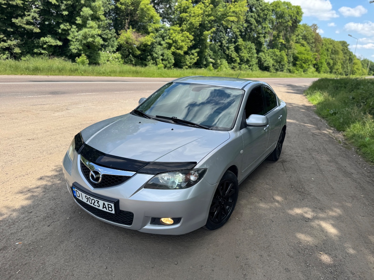 Mazda 3 - фото 16