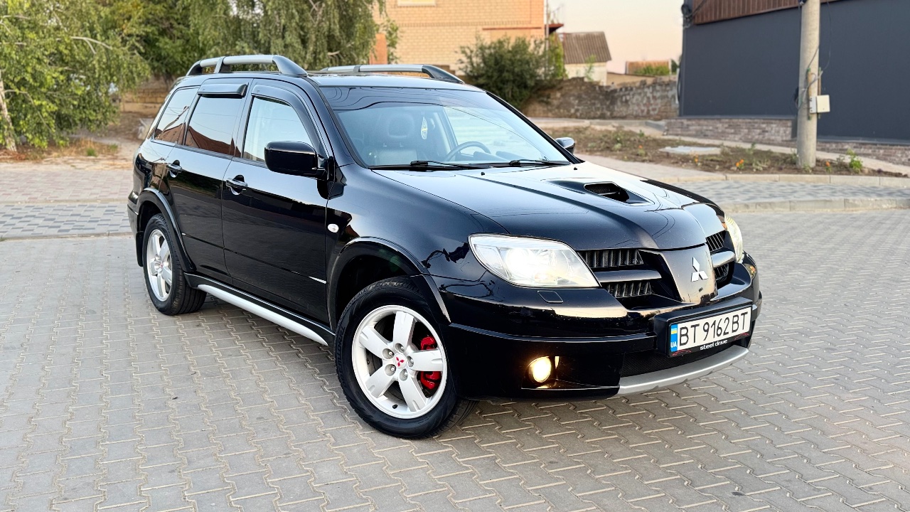 Mitsubishi Outlander - фото 4