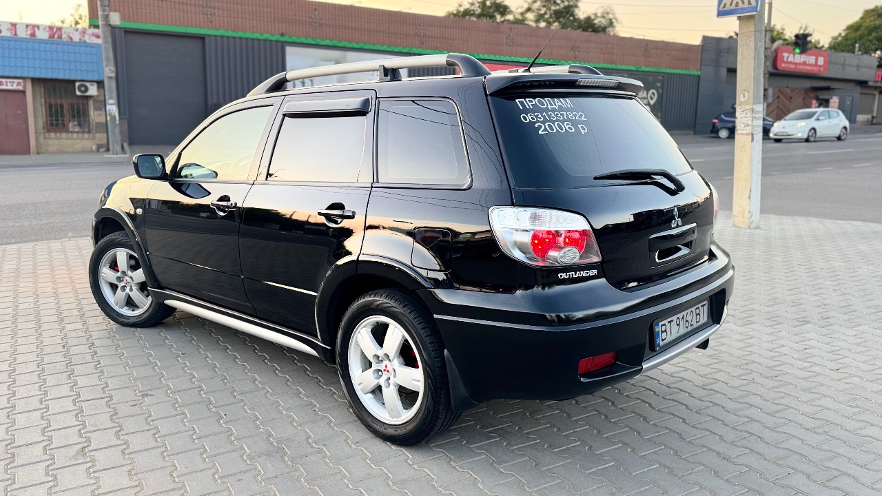 Mitsubishi Outlander - фото 2
