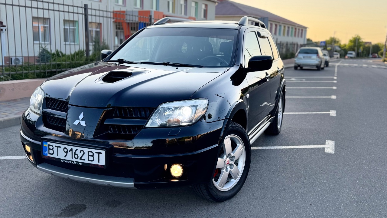 Mitsubishi Outlander - фото 8