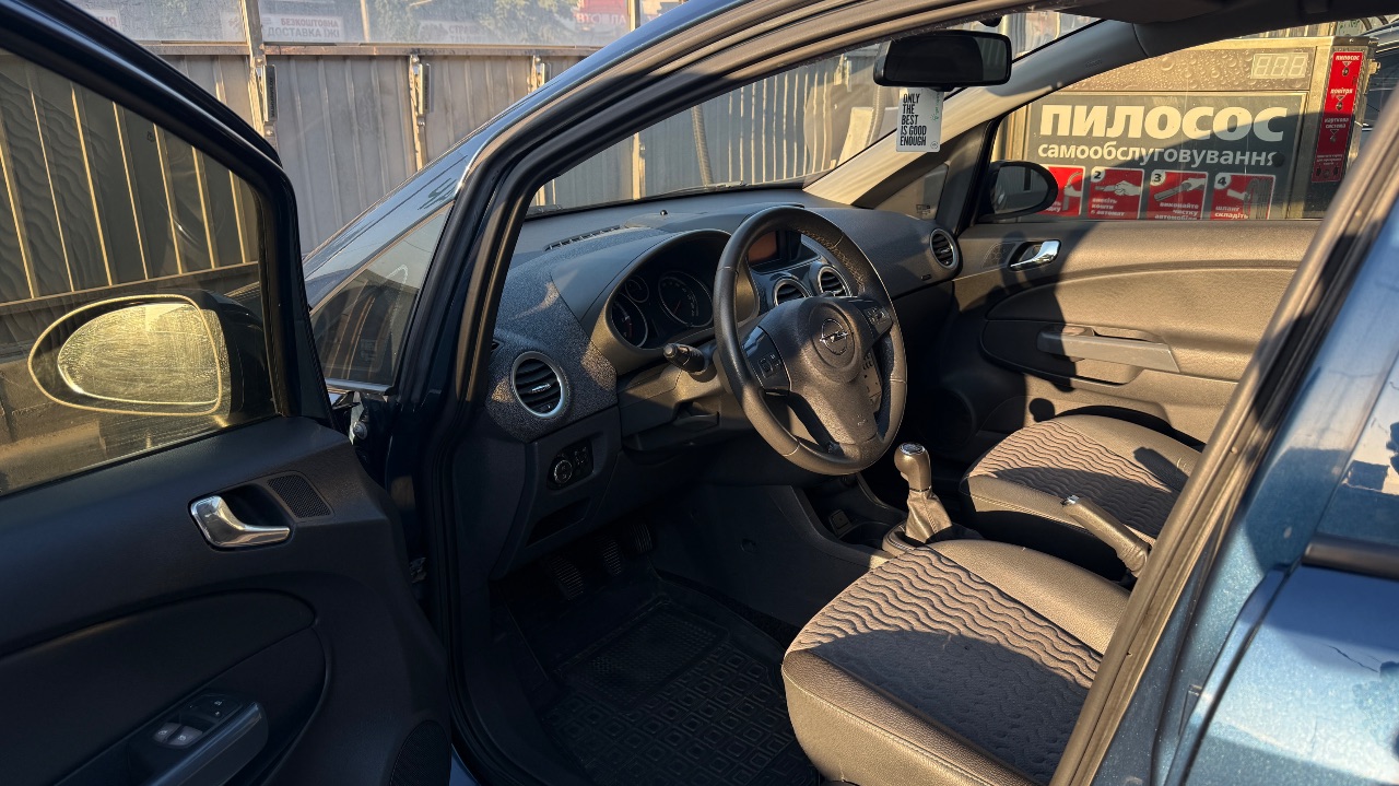 Opel Corsa - фото 8