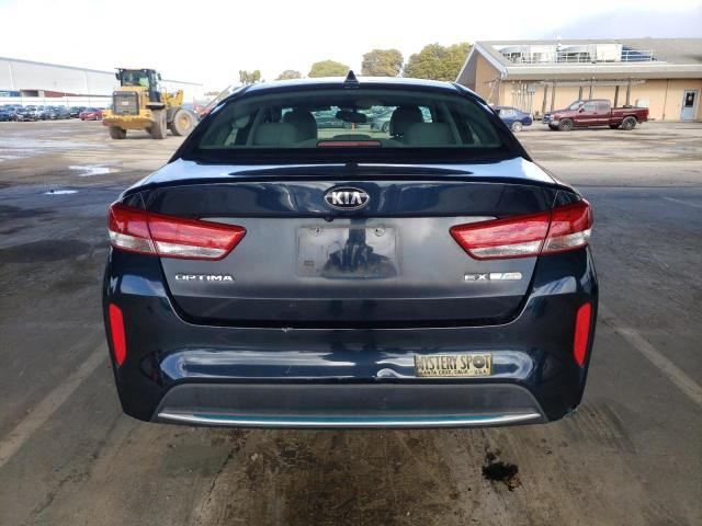 Kia Optima - фото 4