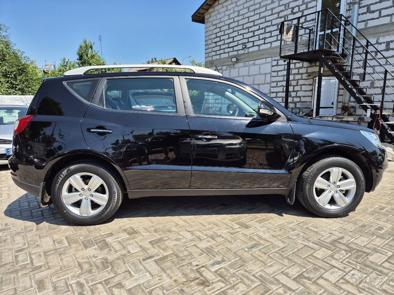 Geely Emgrand X7 - фото 7