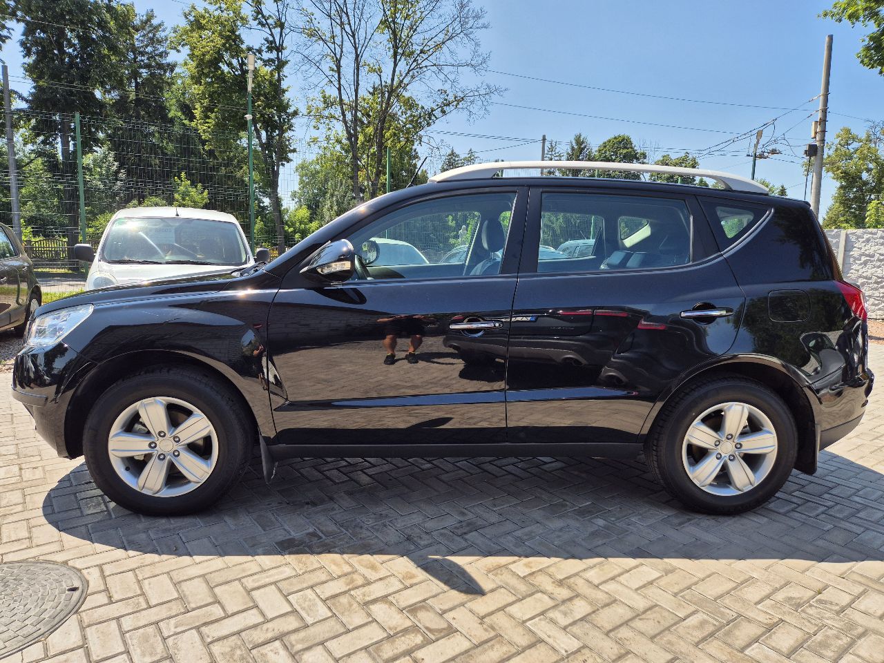 Geely Emgrand X7 - фото 13