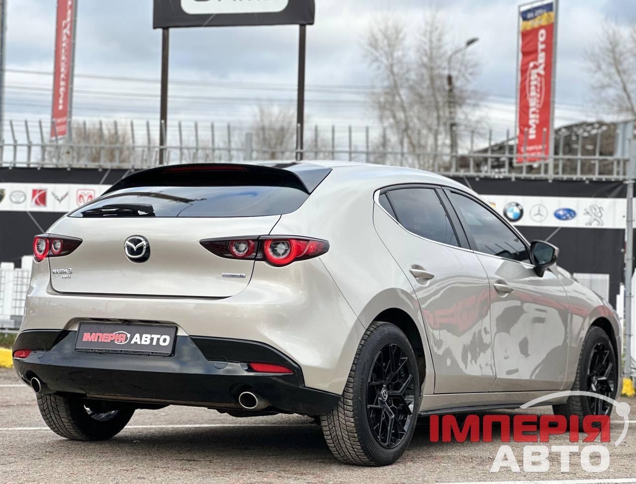 Mazda 3 - фото 4