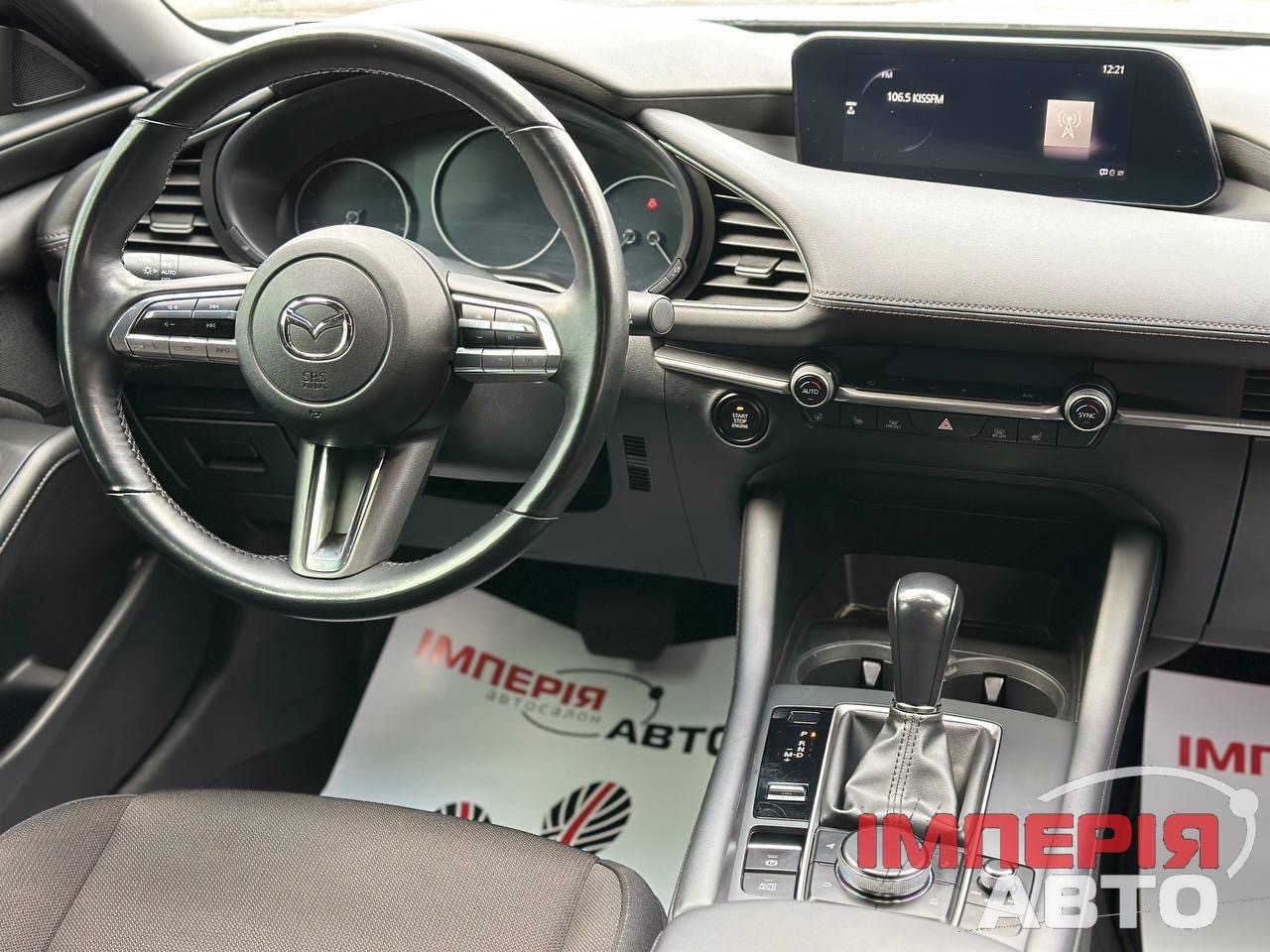 Mazda 3 - фото 6