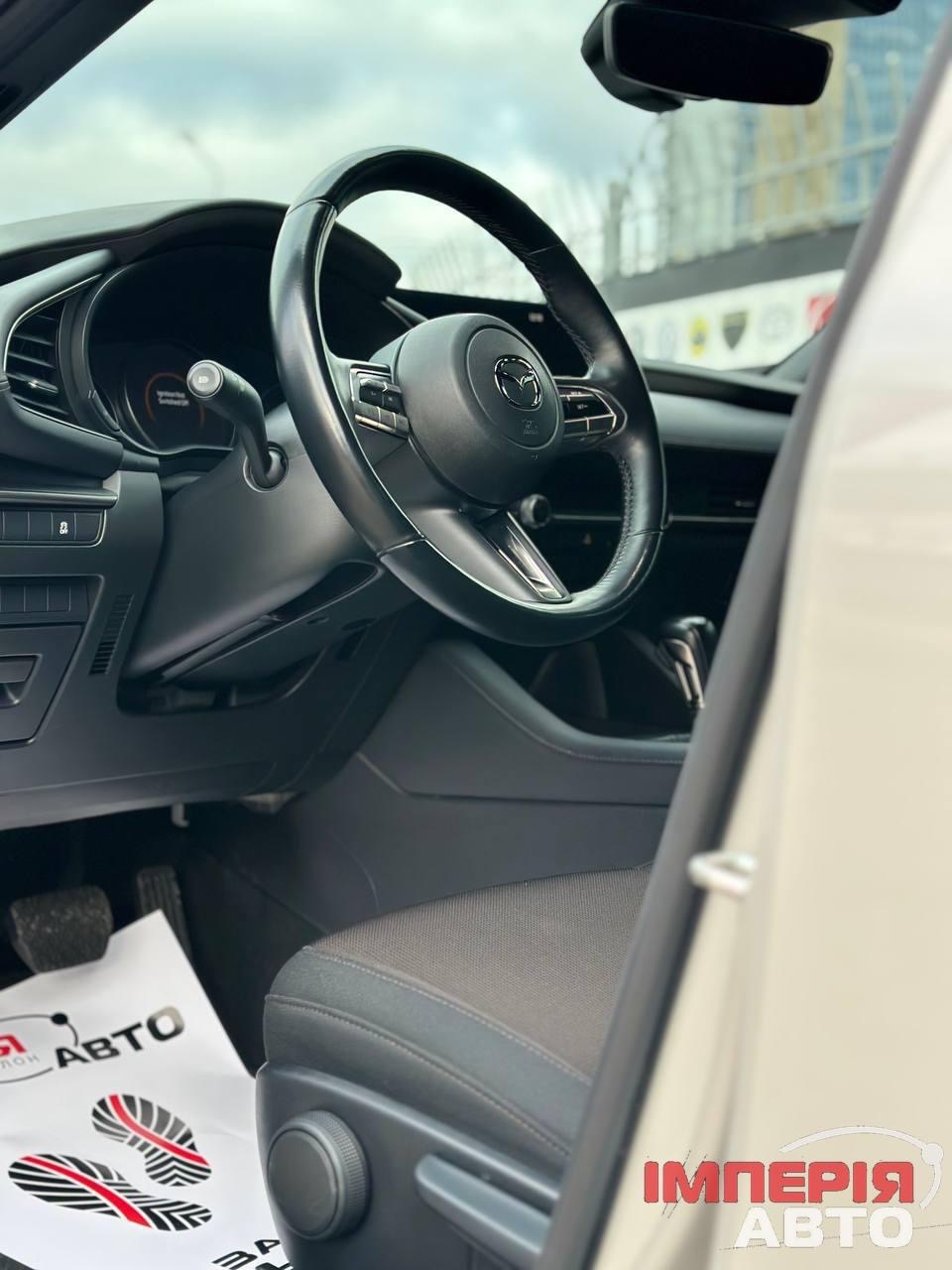 Mazda 3 - фото 7