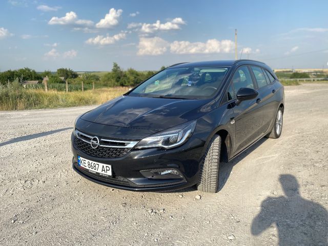 Opel Astra - фото 1