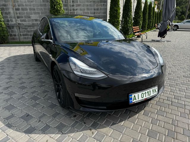 Tesla Model 3 - фото 1