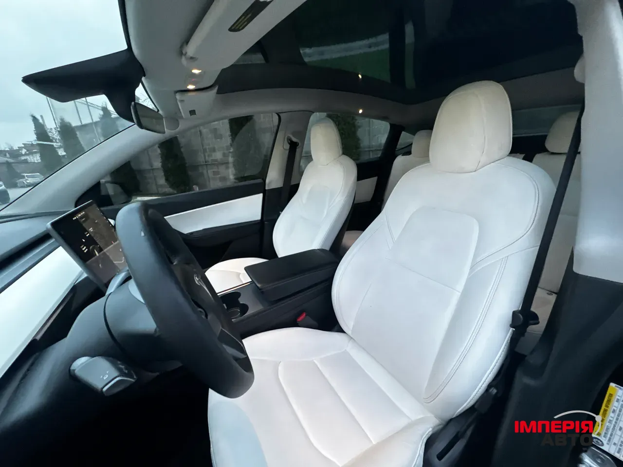 Tesla Model Y - фото 12