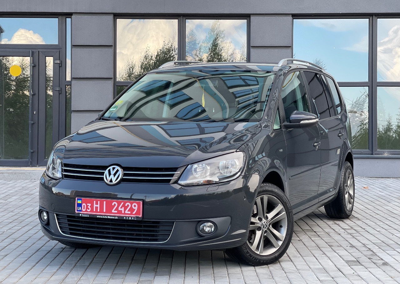 Volkswagen Touran - фото 1
