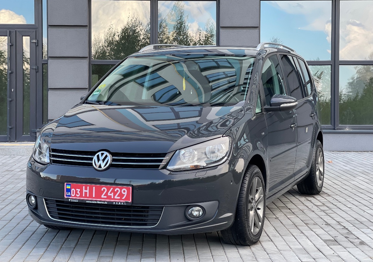 Volkswagen Touran - фото 4