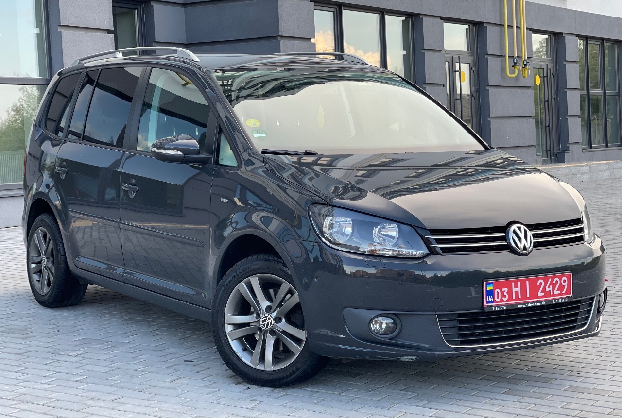 Volkswagen Touran - фото 12