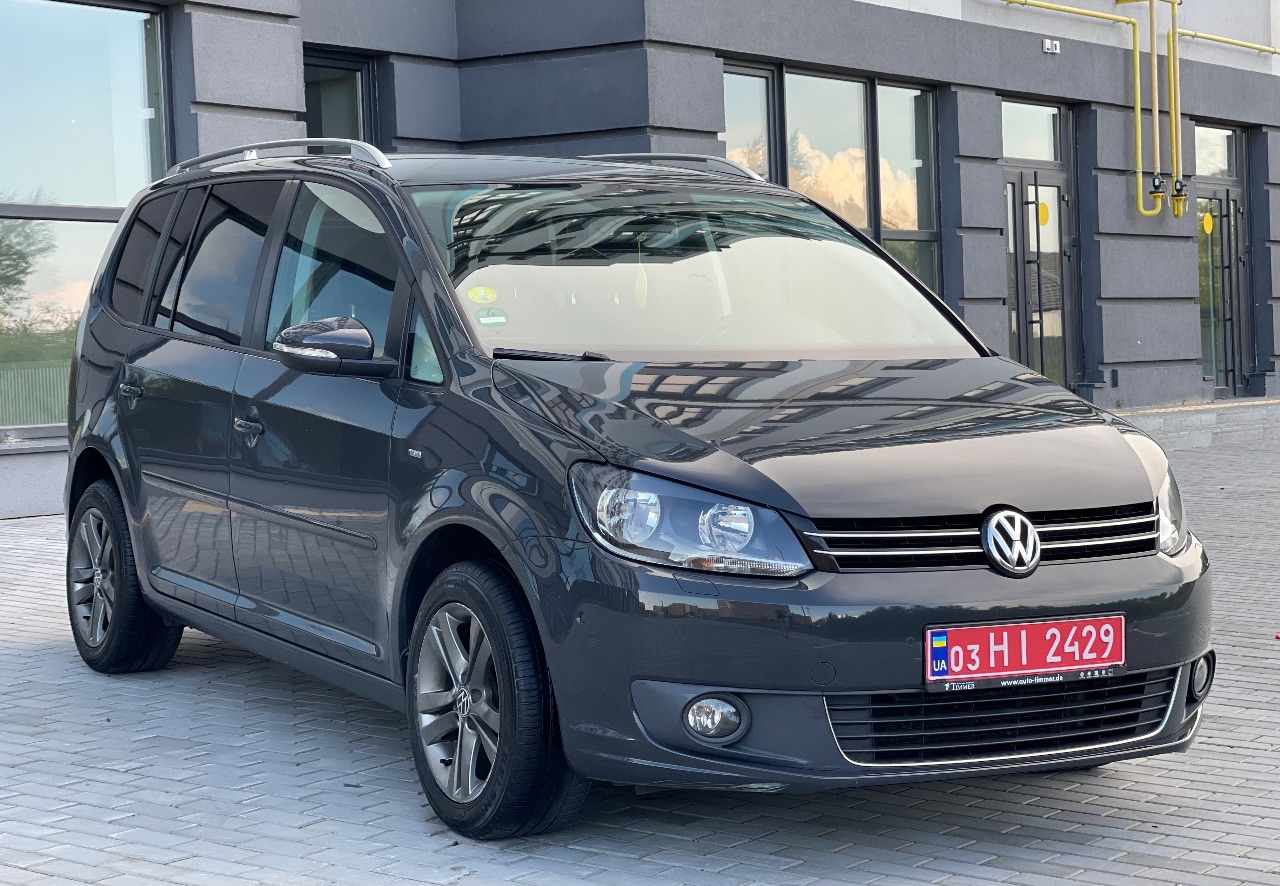 Volkswagen Touran - фото 11