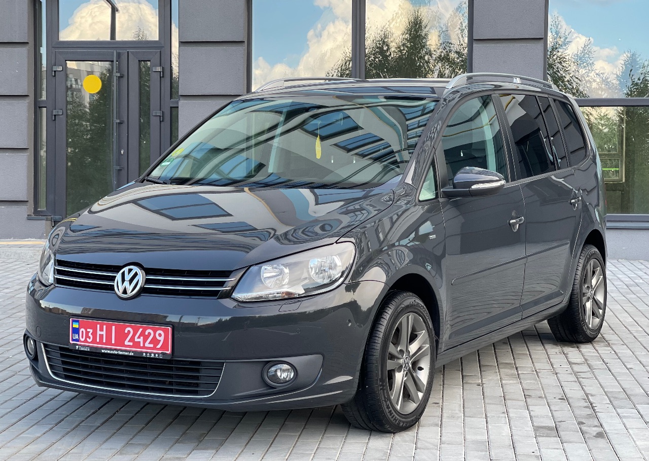 Volkswagen Touran - фото 5