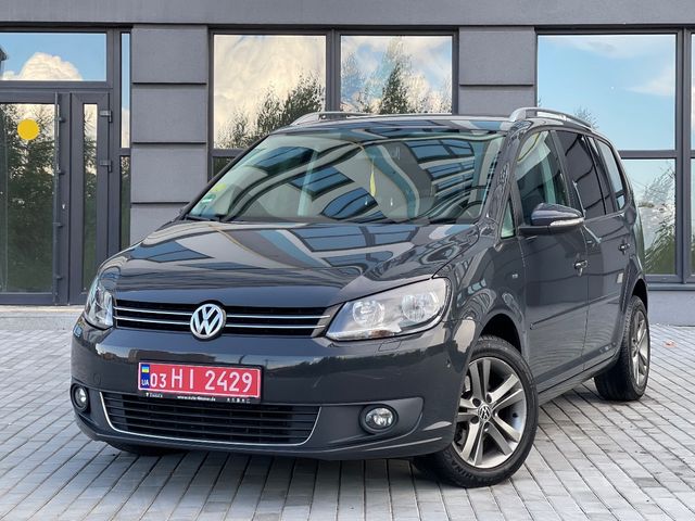 Volkswagen Touran - фото 1