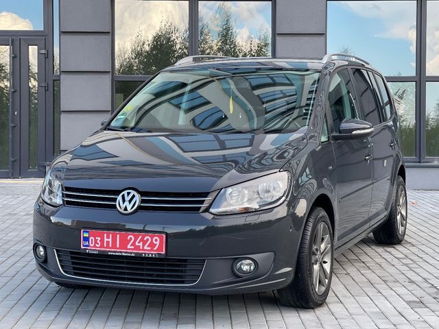 Volkswagen Touran - фото 4