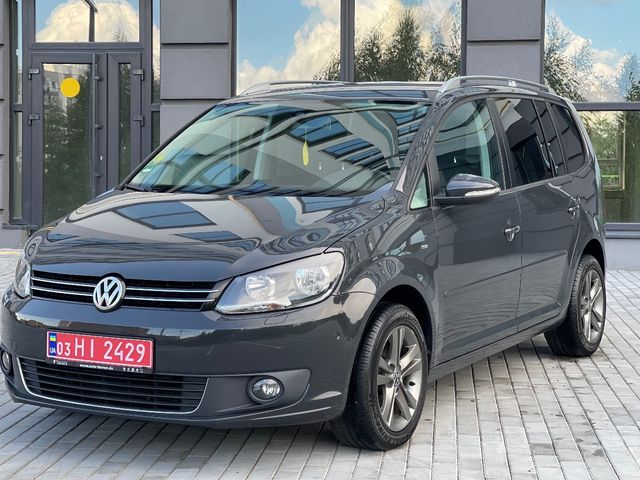 Volkswagen Touran - фото 5