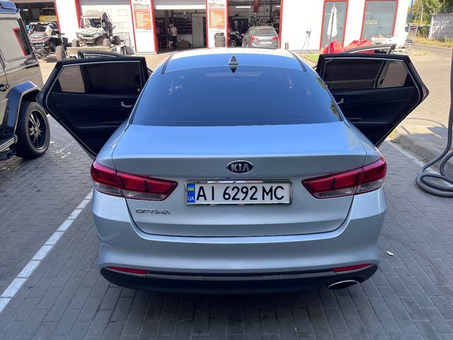 Kia Optima - фото 5