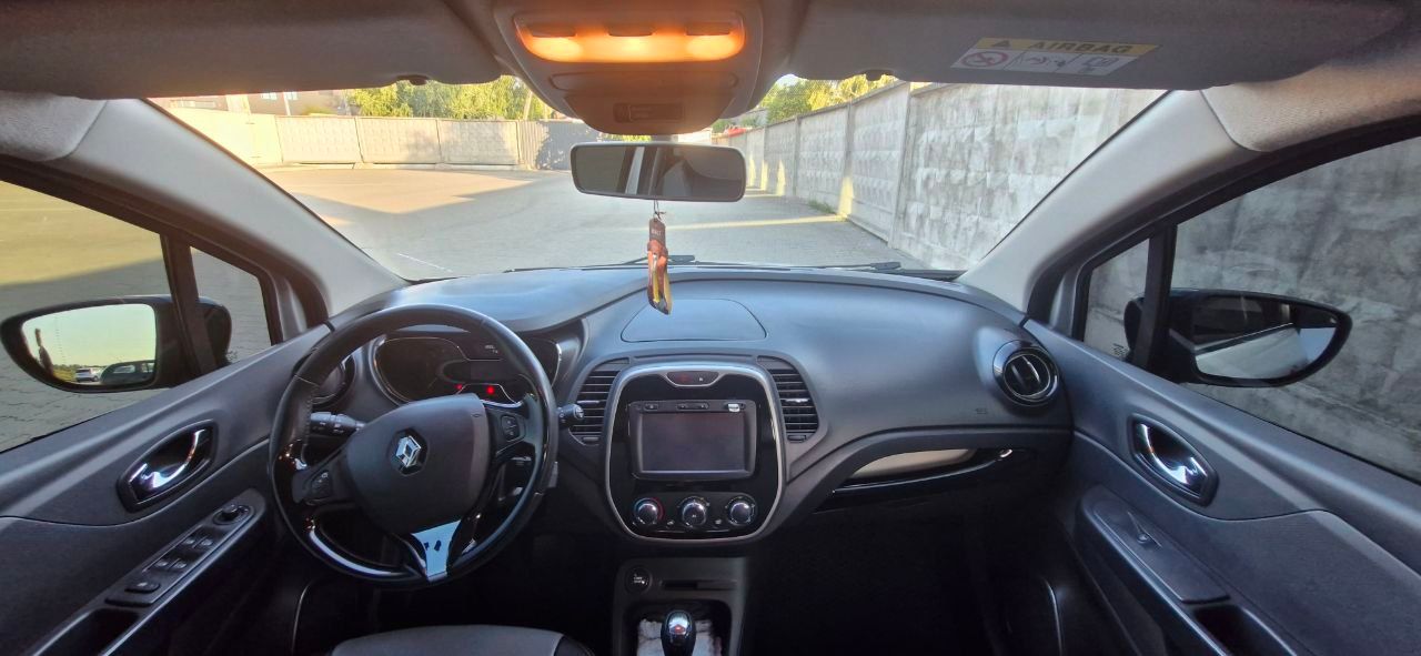 Renault Captur - фото 16