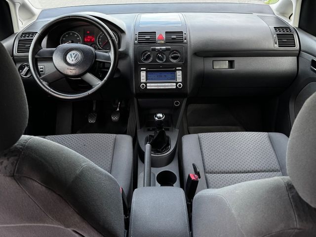 Volkswagen Touran - фото 5