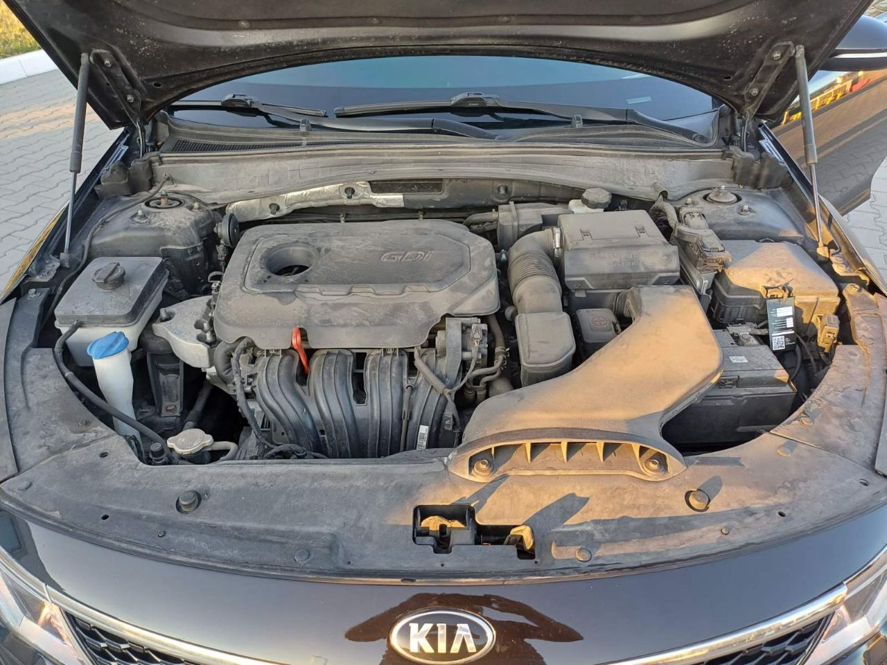 Kia Optima - фото 14