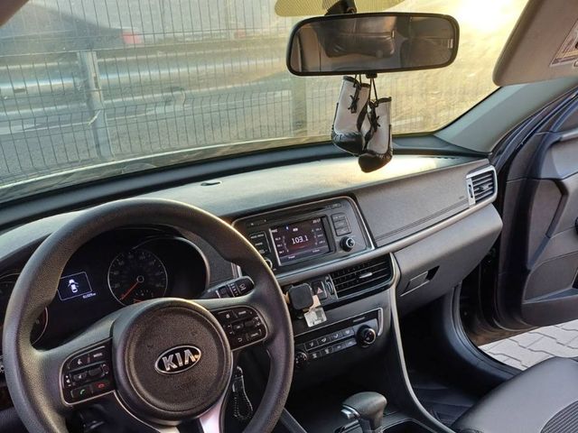 Kia Optima - фото 4