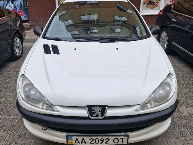 Peugeot 206 - фото 1