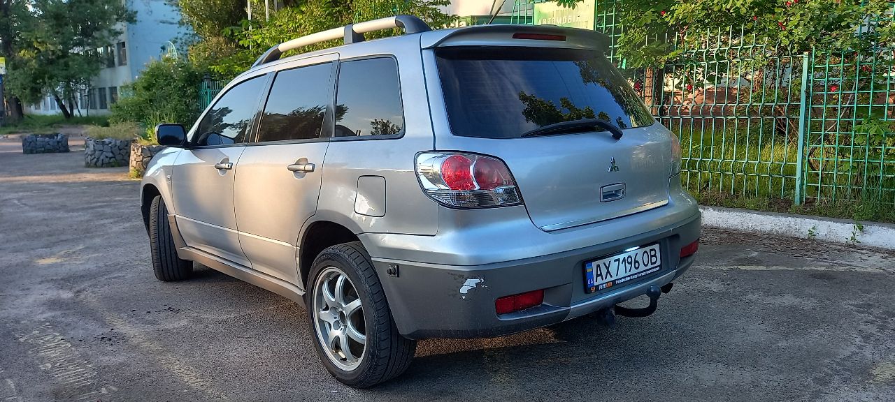 Mitsubishi Outlander - фото 1