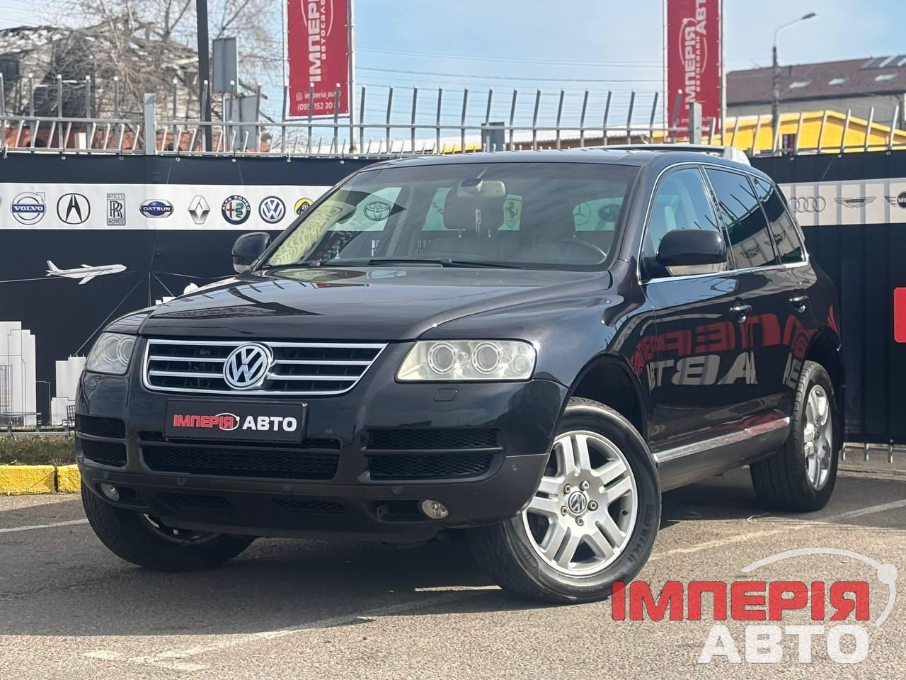 Volkswagen Touareg - фото 1