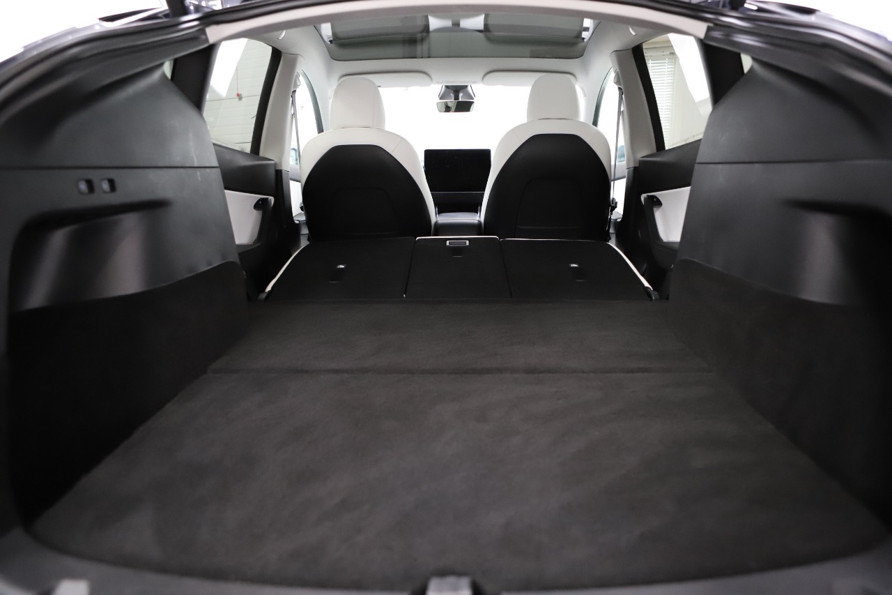 Tesla Model Y - фото 10