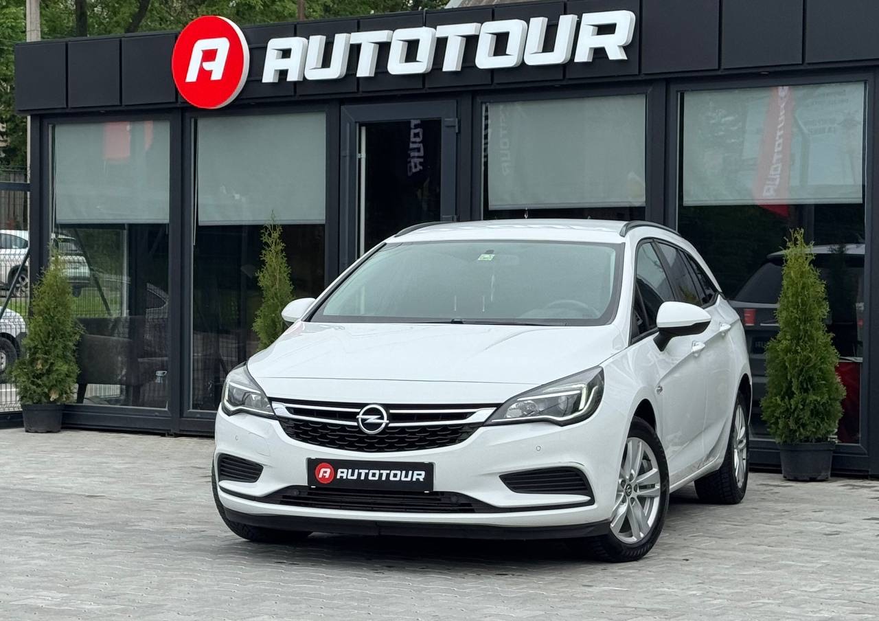 Opel Astra - фото 1