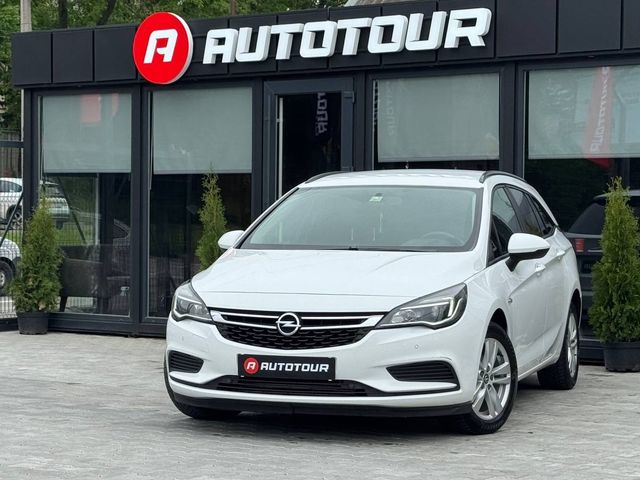 Opel Astra - фото 1