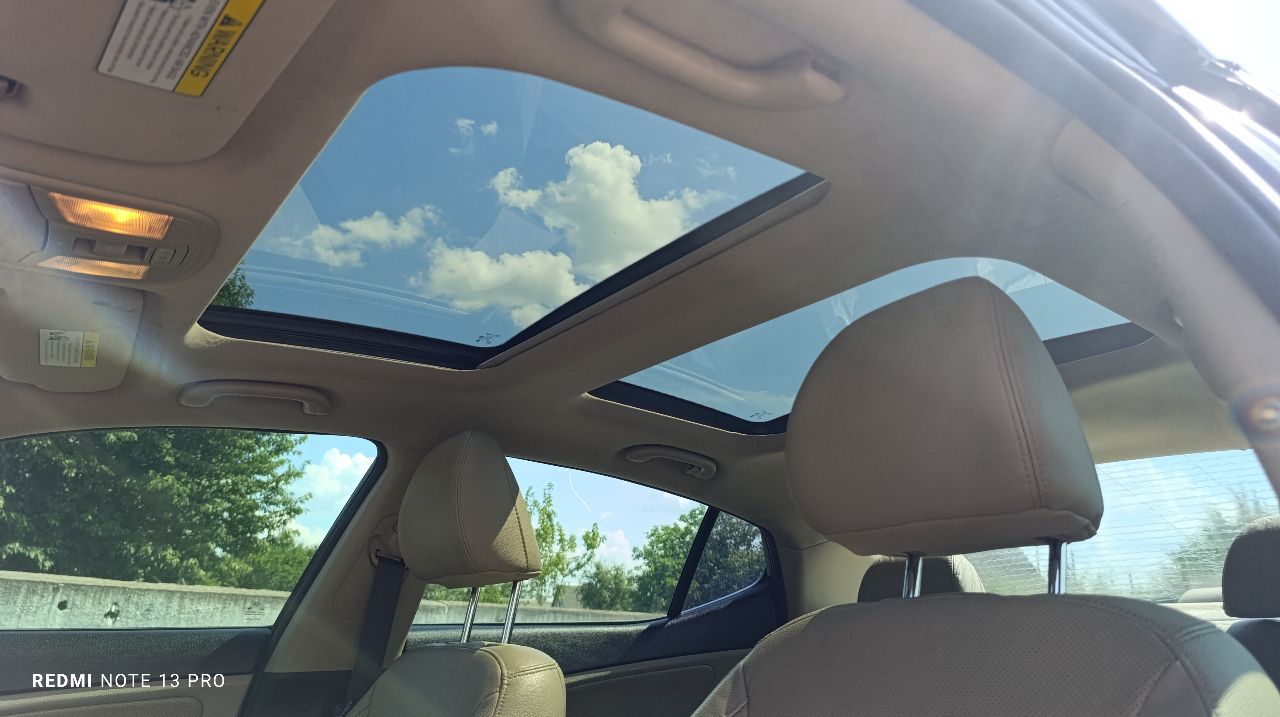 Kia Optima - фото 5