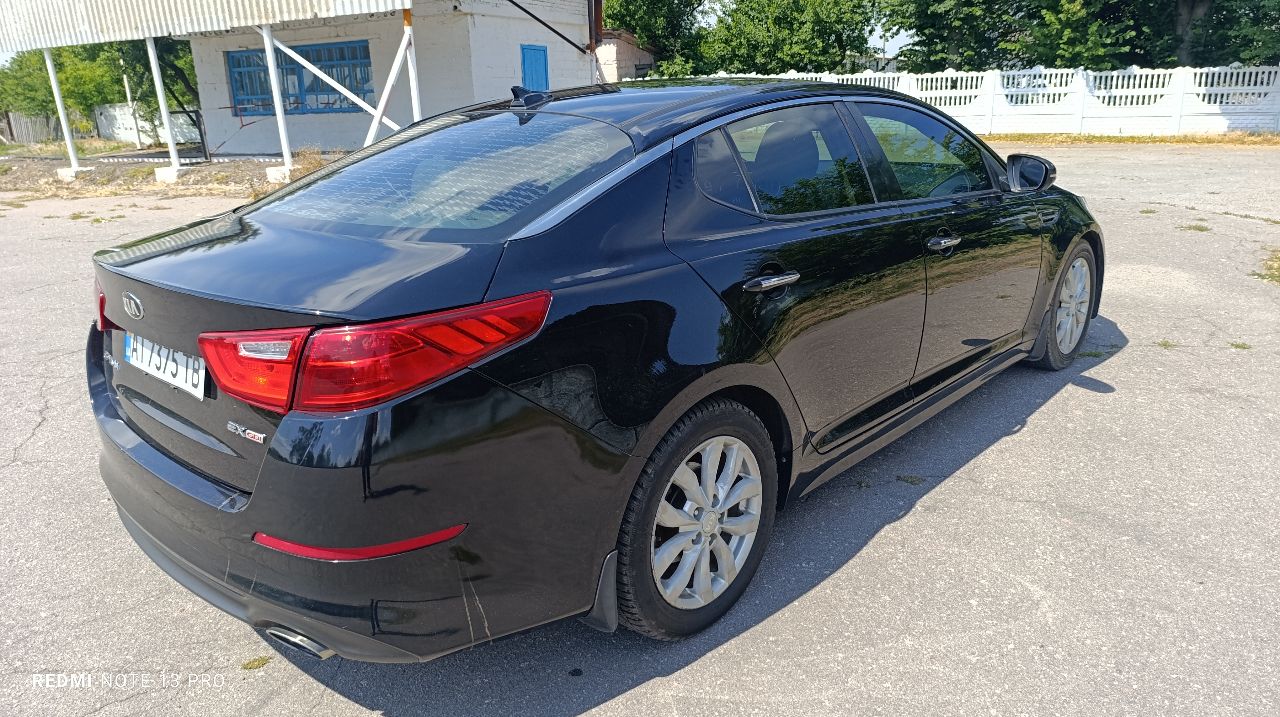 Kia Optima - фото 18