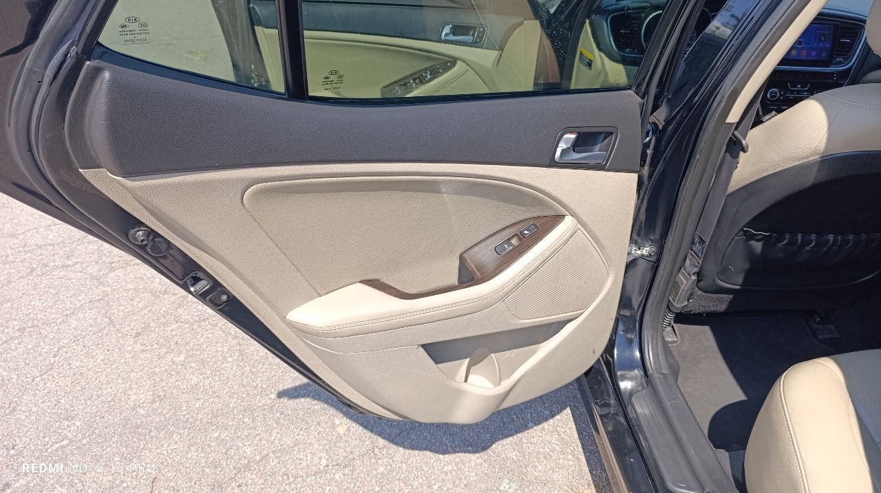 Kia Optima - фото 8