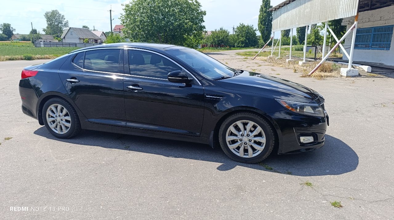 Kia Optima - фото 29
