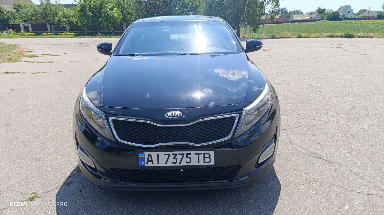 Kia Optima - фото 1