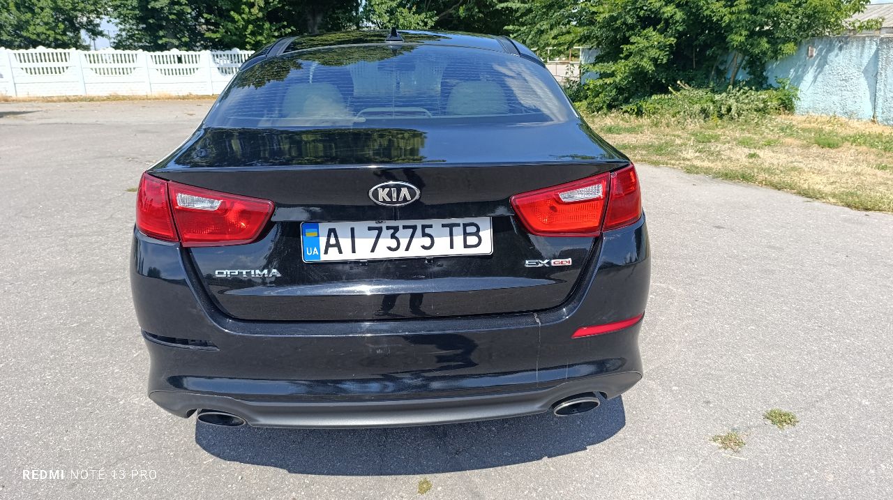 Kia Optima - фото 6