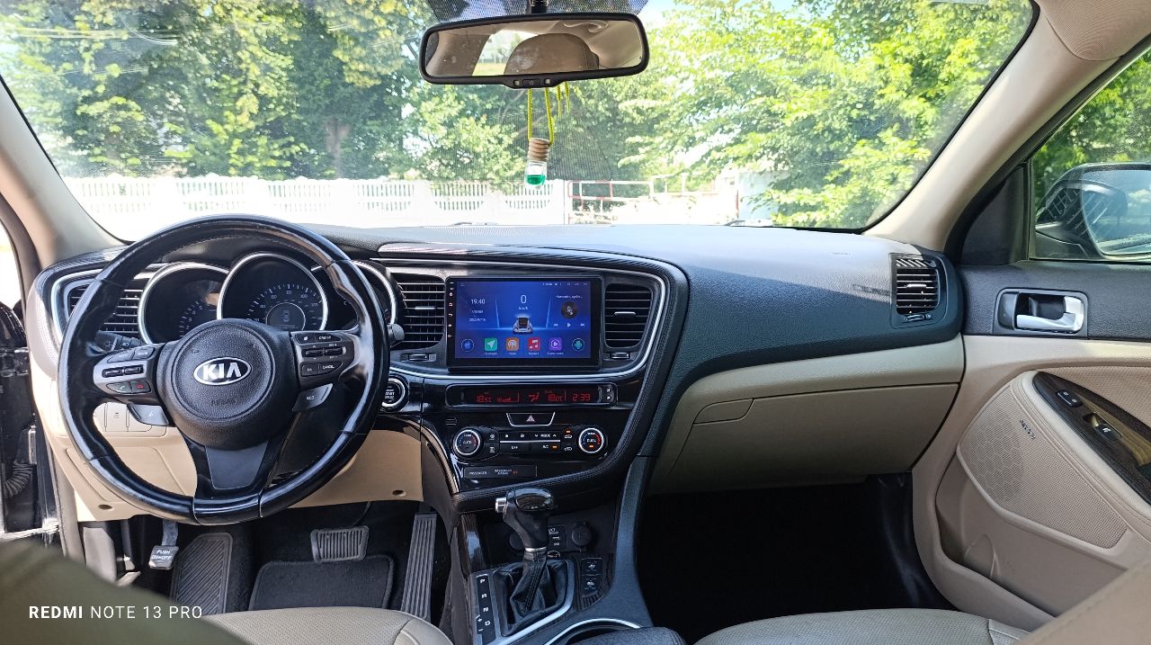 Kia Optima - фото 7