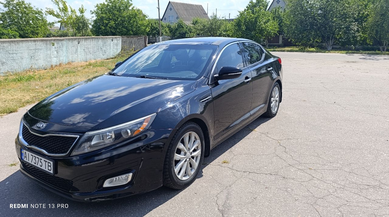 Kia Optima - фото 16